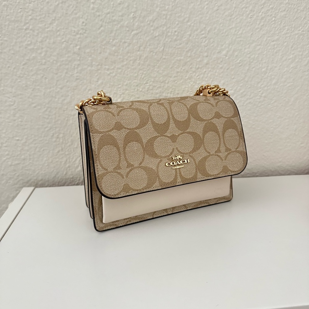 Coach mini Klare crossbody bag in signature canvas NWT.